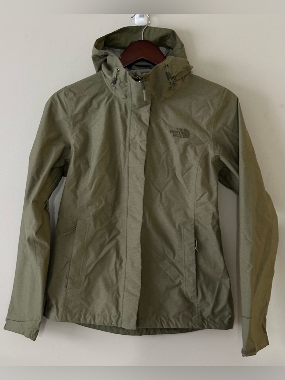 The North Face women’s small green jacket some damage inside